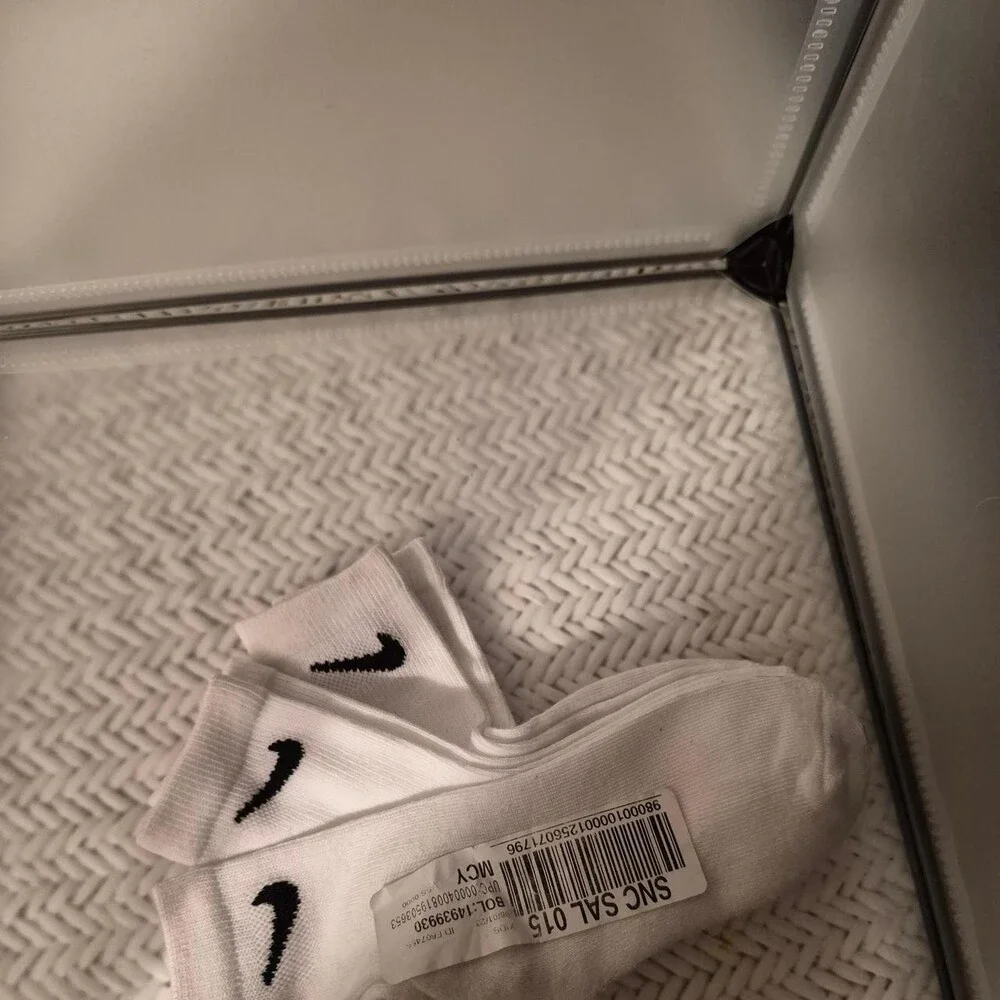 Nike white socks with black swoosh, size US 10 #athletic #swoosh